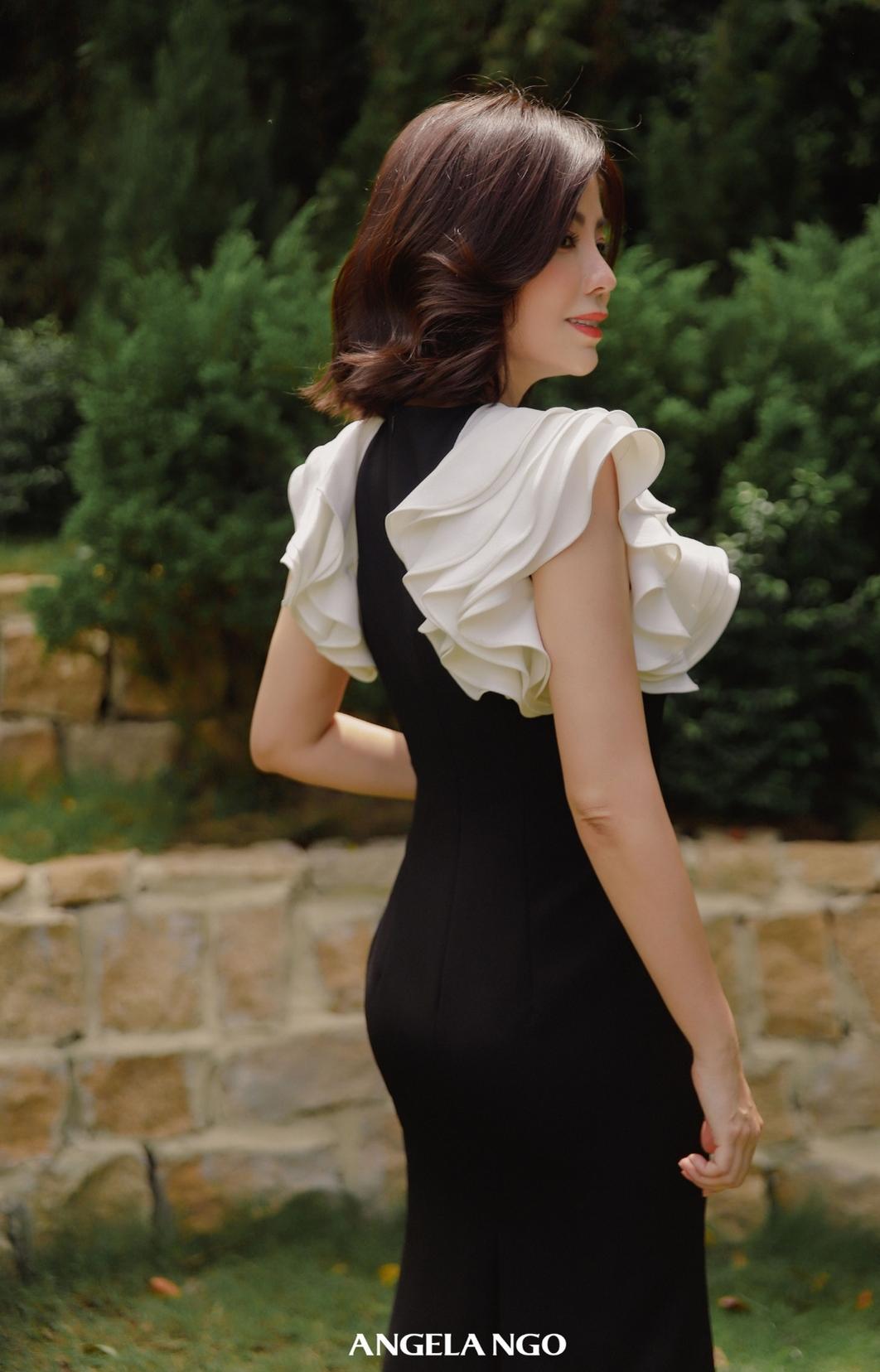 Đầm dạ hội đen phối tay trắng cách điệu